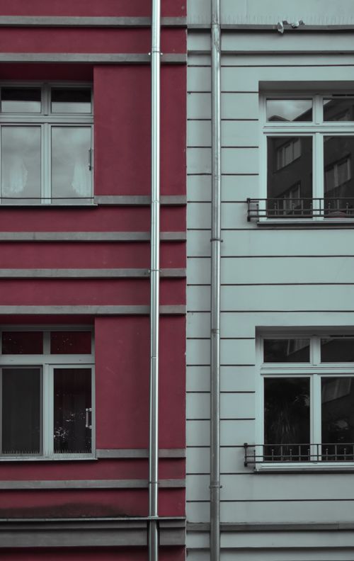 Free A contrasting urban facade showcasing vibrant architecture in Warsaw, Poland. Stock Photo