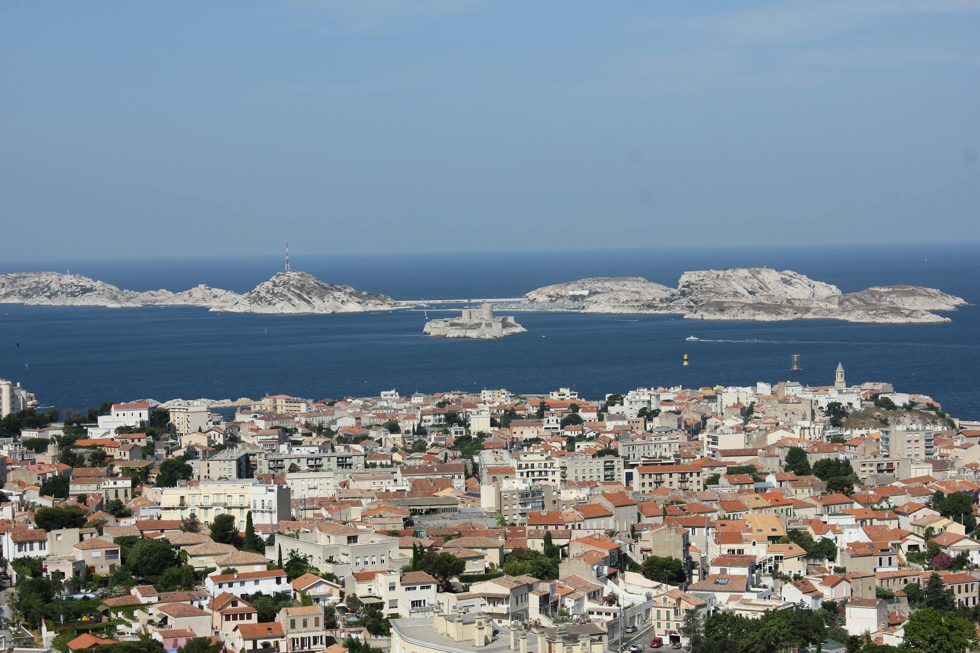 Explore the vibrant cityscape of Marseille against the Mediterranean backdrop.