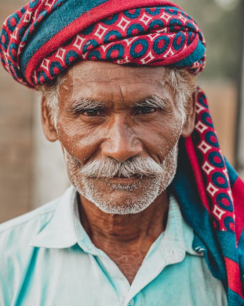 Elderly Man Wearing Traditional Headscarf