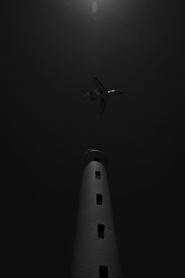 Airplane Over Tower