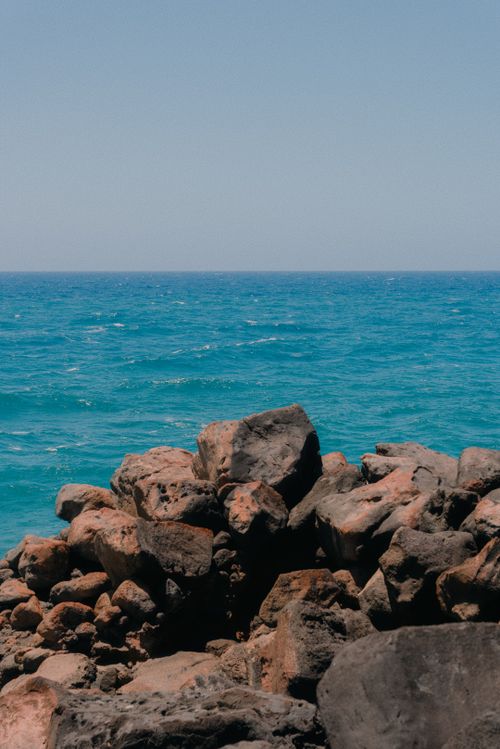 Seascape Rocks Brown Brown Rocks Near Blue Sea · Free Stock Photo