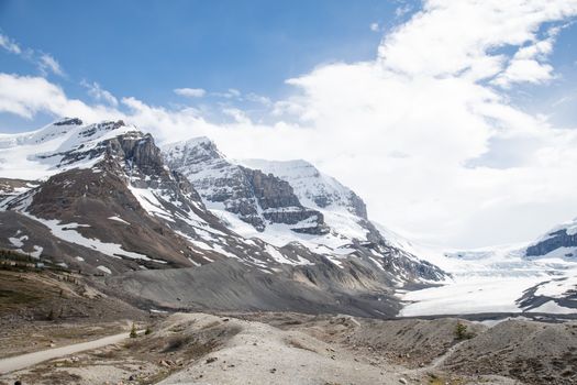 Majestic snow-capped mountains and glacier views in Alberta, Canada on a clear day.