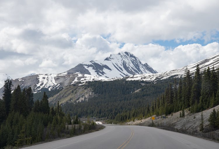 Snowcapped Mountains Seen From Road