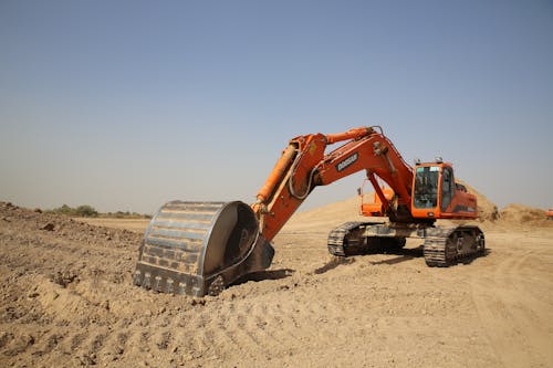 Photo of Orange Excavator
