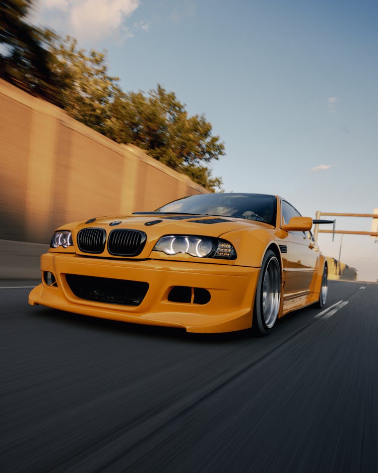 A Yellow BMW E46 On The Road