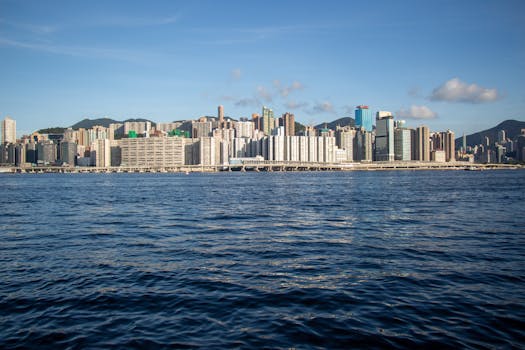 Captivating image of a city skyline with skyscrapers and a tranquil waterfront.