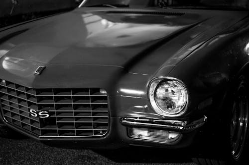 A Grayscale of a Second Generation Chevrolet Camaro