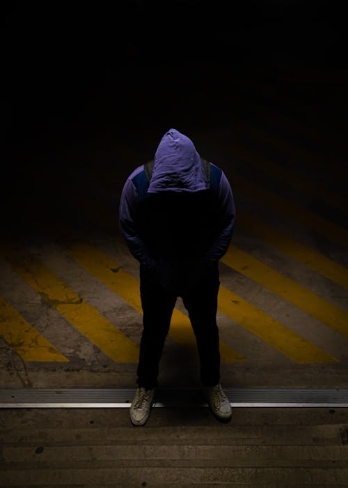 A Person Wearing a Blue Hoodie Jacket
