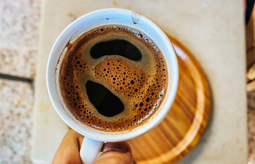 Free Person Holding Cup With Coffee Stock Photo