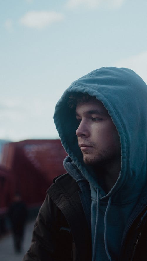 A Portrait of a Man Wearing a Hoodie