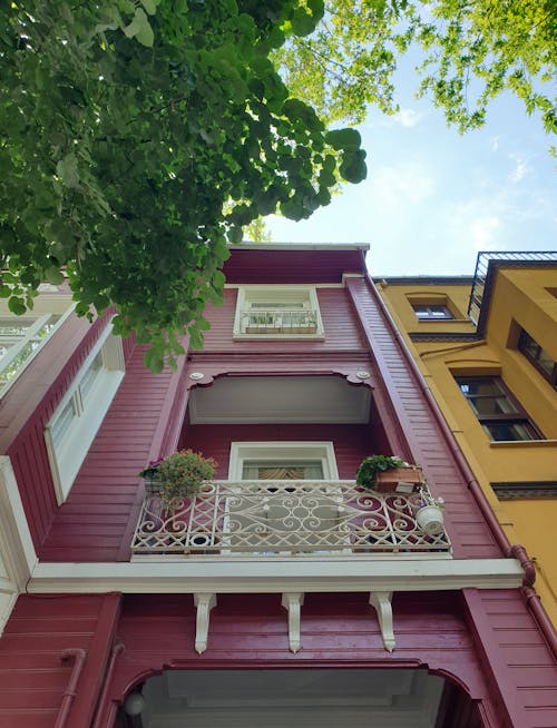A Pink Building with Balconies