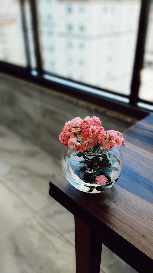 Close Up of Flowers in Vase on Table