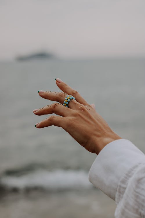 Free Photo of a Person's Hand Reaching Stock Photo
