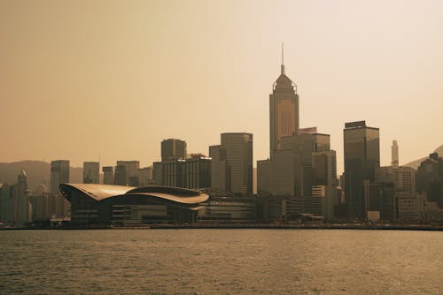 Free A Victoria Harbour Near the Body of Water Stock Photo