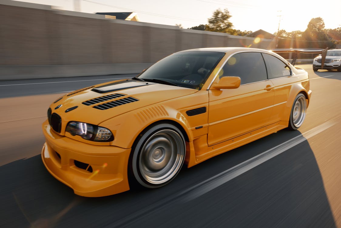 A Yellow BMW E46 on the Road