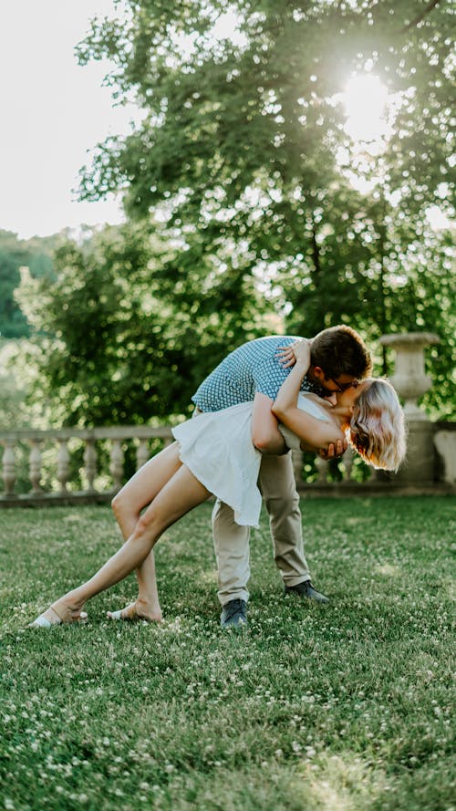 Couple Hugging Kissing Outdoors