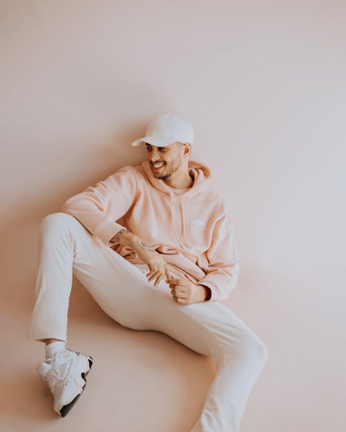 Man Sitting on White Background