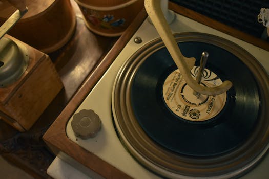 Close-up of a vintage turntable spinning a vinyl record, evoking nostalgia.