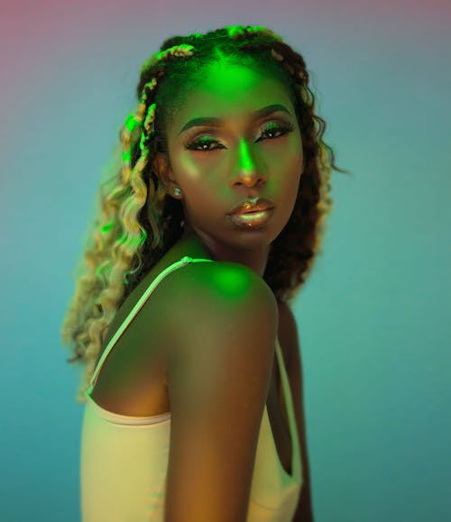 Beautiful Woman Posing in Green Glow