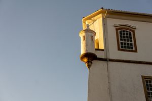 Corner turret of a civic building against clear sky — photo by Lucia Barreiros Silva on Pexels