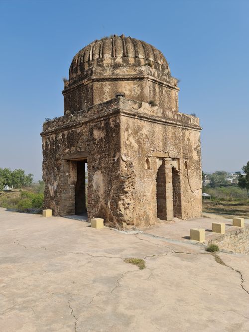 Free Old stone structure captured on a sunny day with clear sky. Stock Photo