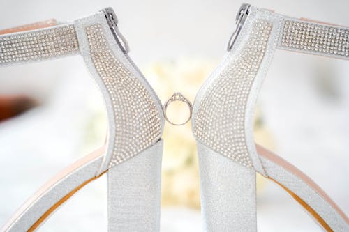 Diamond Ring between a Pair of Heels