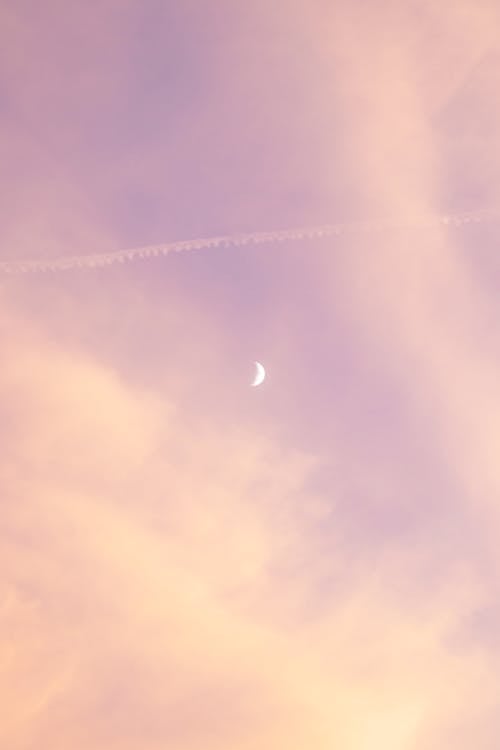 Crescent Moon and Sunset Sky in Pastel Pink and Purple Colors 