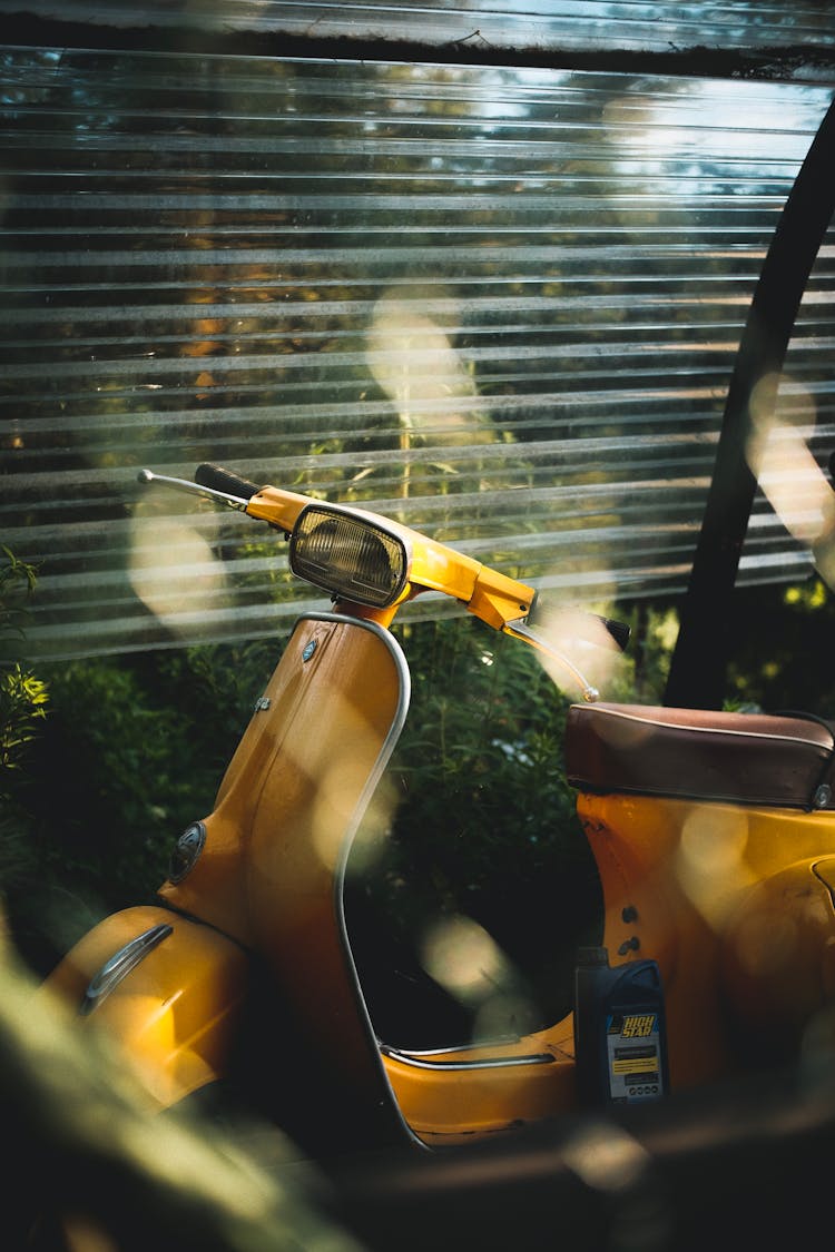 Close Up Of Yellow Scooter