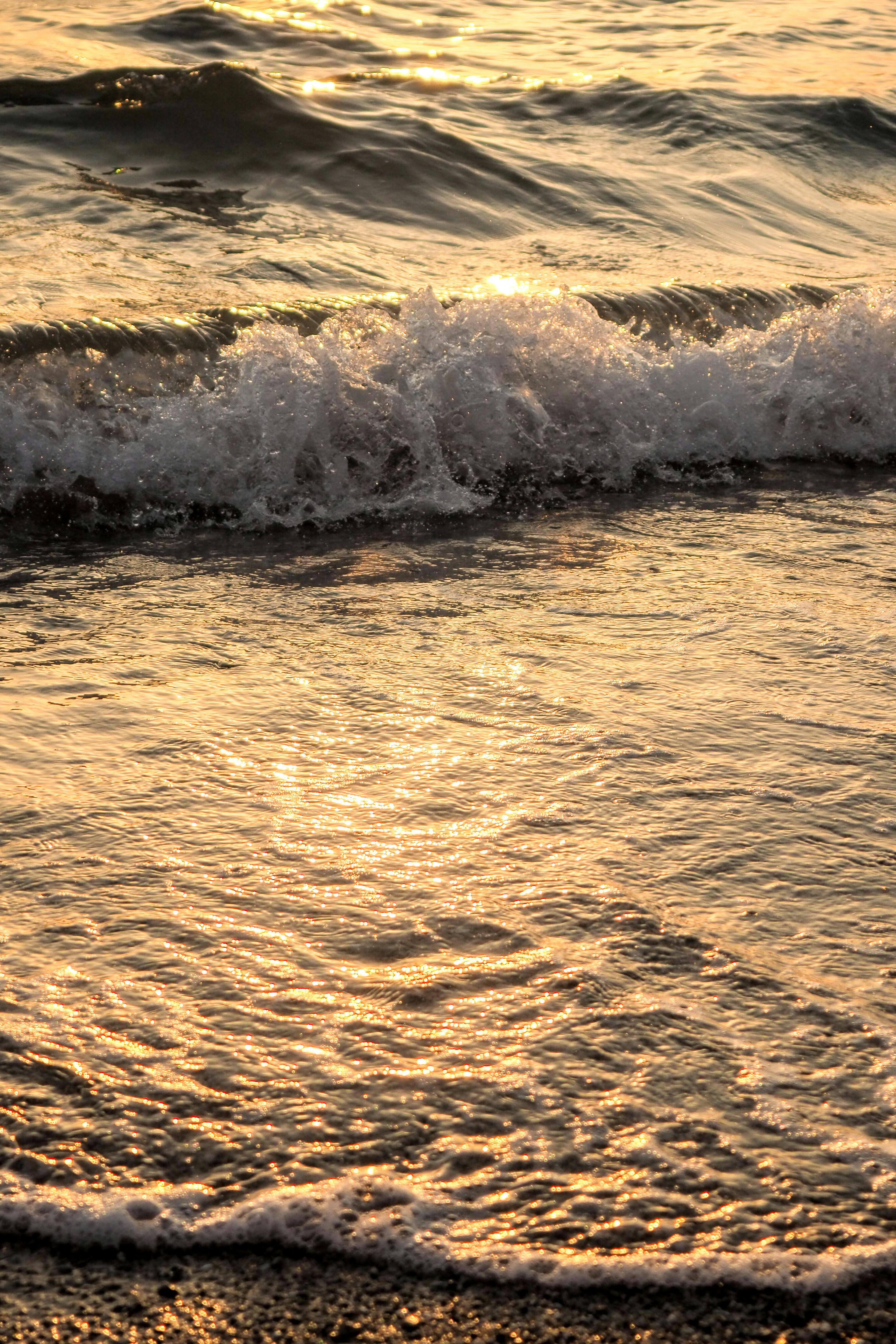 Calm Water With Sun and Orange Sky · Free Stock Photo