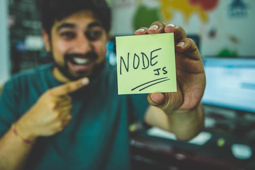 Free Person Holding Node Text Stock Photo