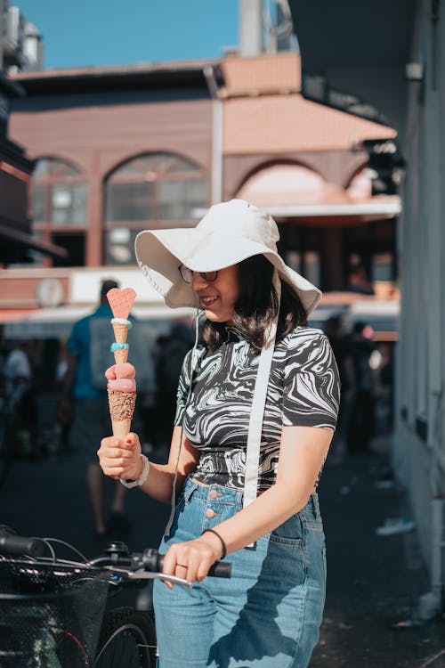 Woman Holding Ice Cream Cone