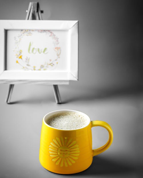 Free Yellow and White Ceramic Mug With Coffee Stock Photo