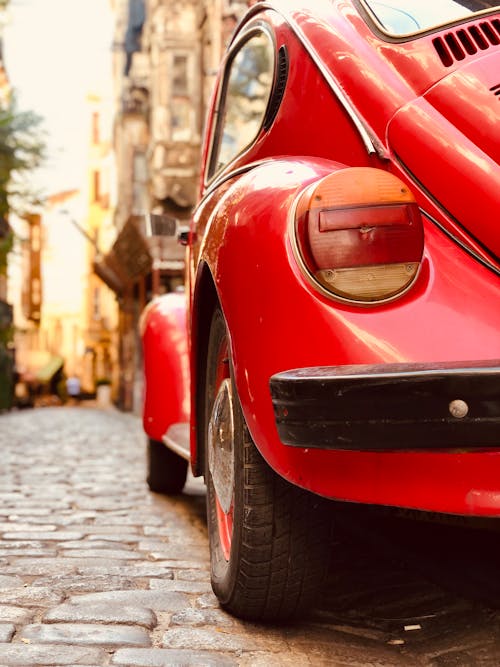 Close Up Photo of Red Classic Car