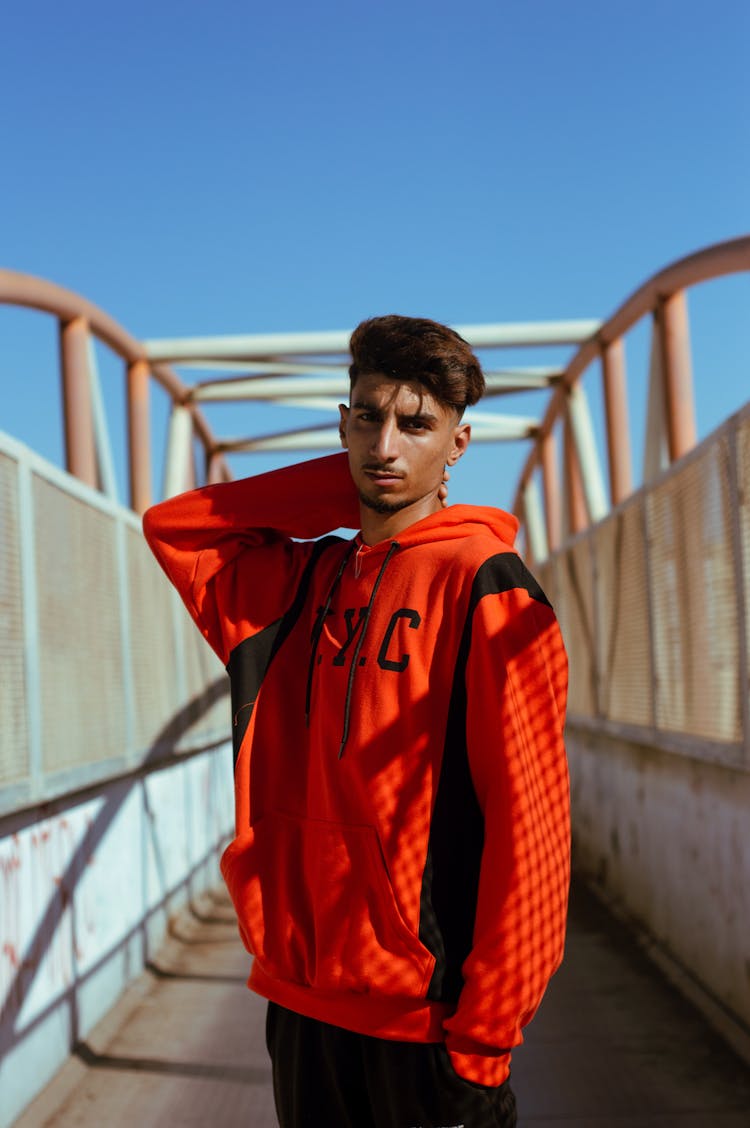 Photo Of A Man In A Red And Black Hoodie