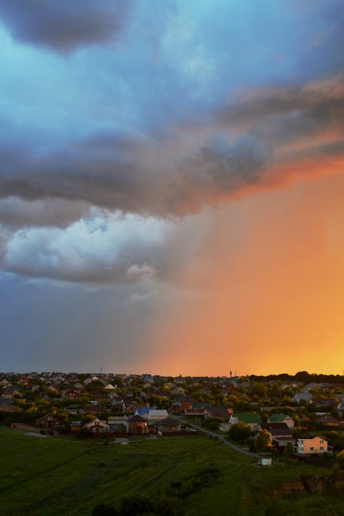 Cloudy Sky over Houses