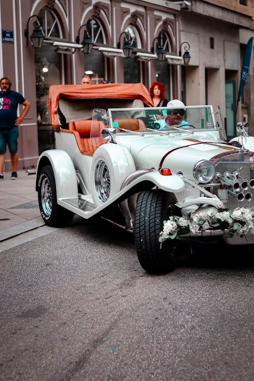 White and Brown Vintage Car