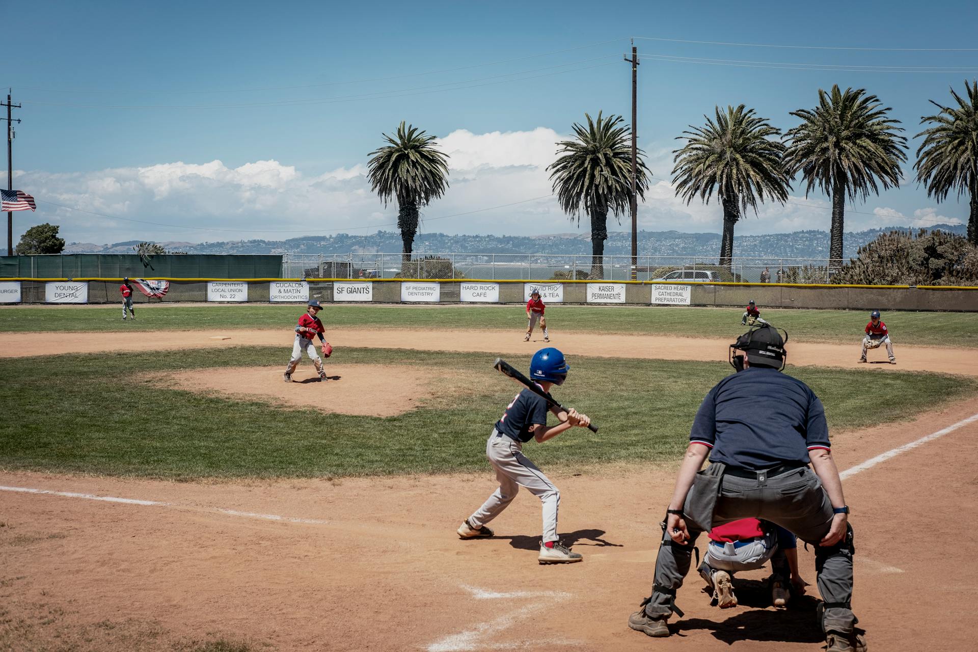 Children Playing Baseball on Sports Ground