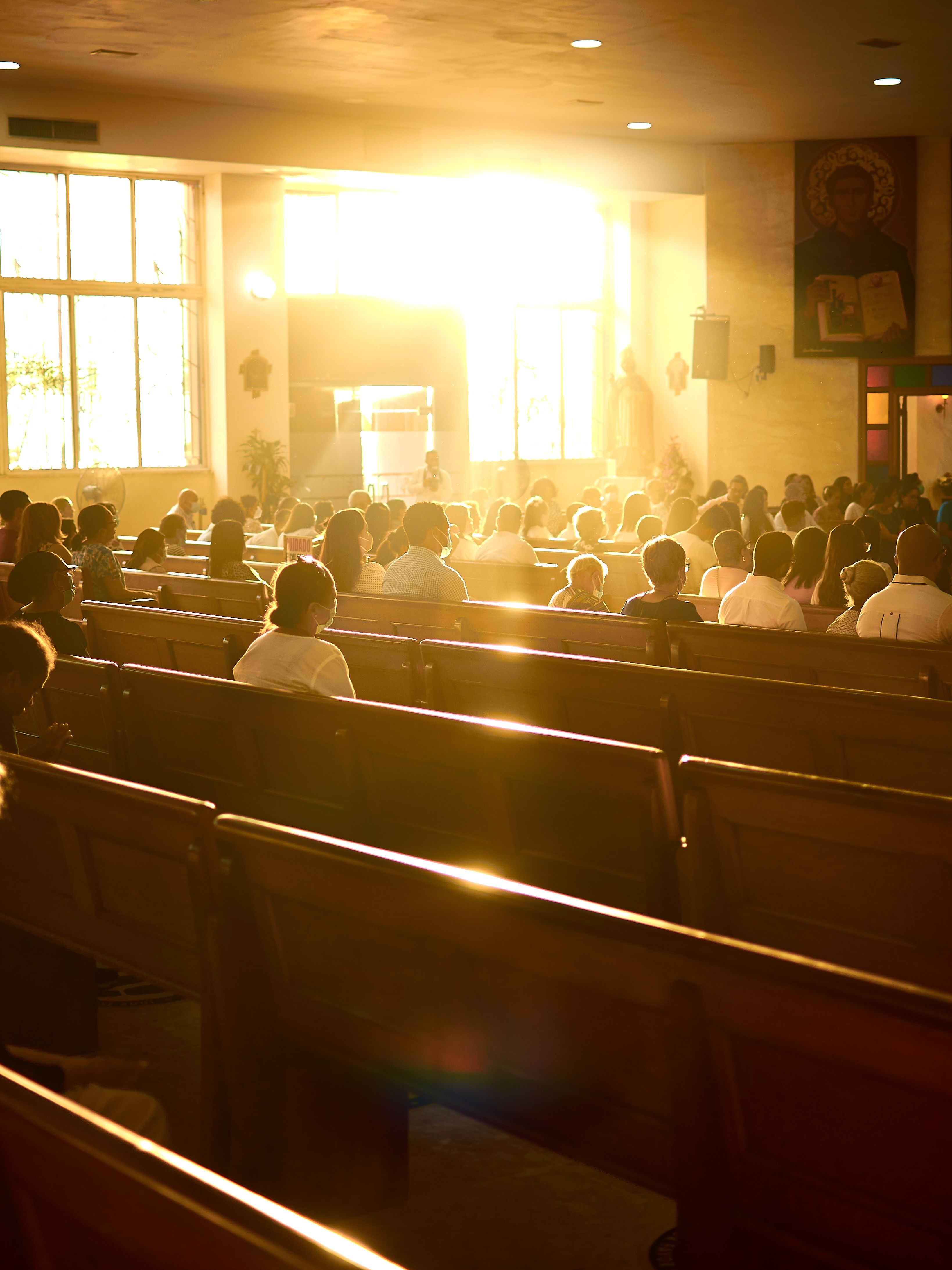 A congregation seated in the pews during a service