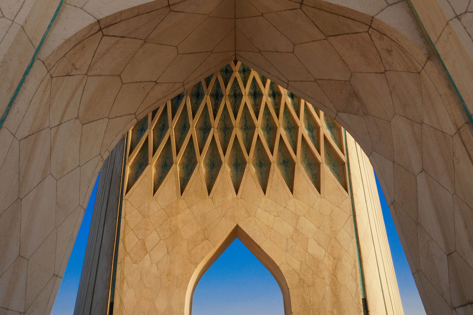 Close-up architectural details of the iconic Azadi Tower in Tehran, Iran.