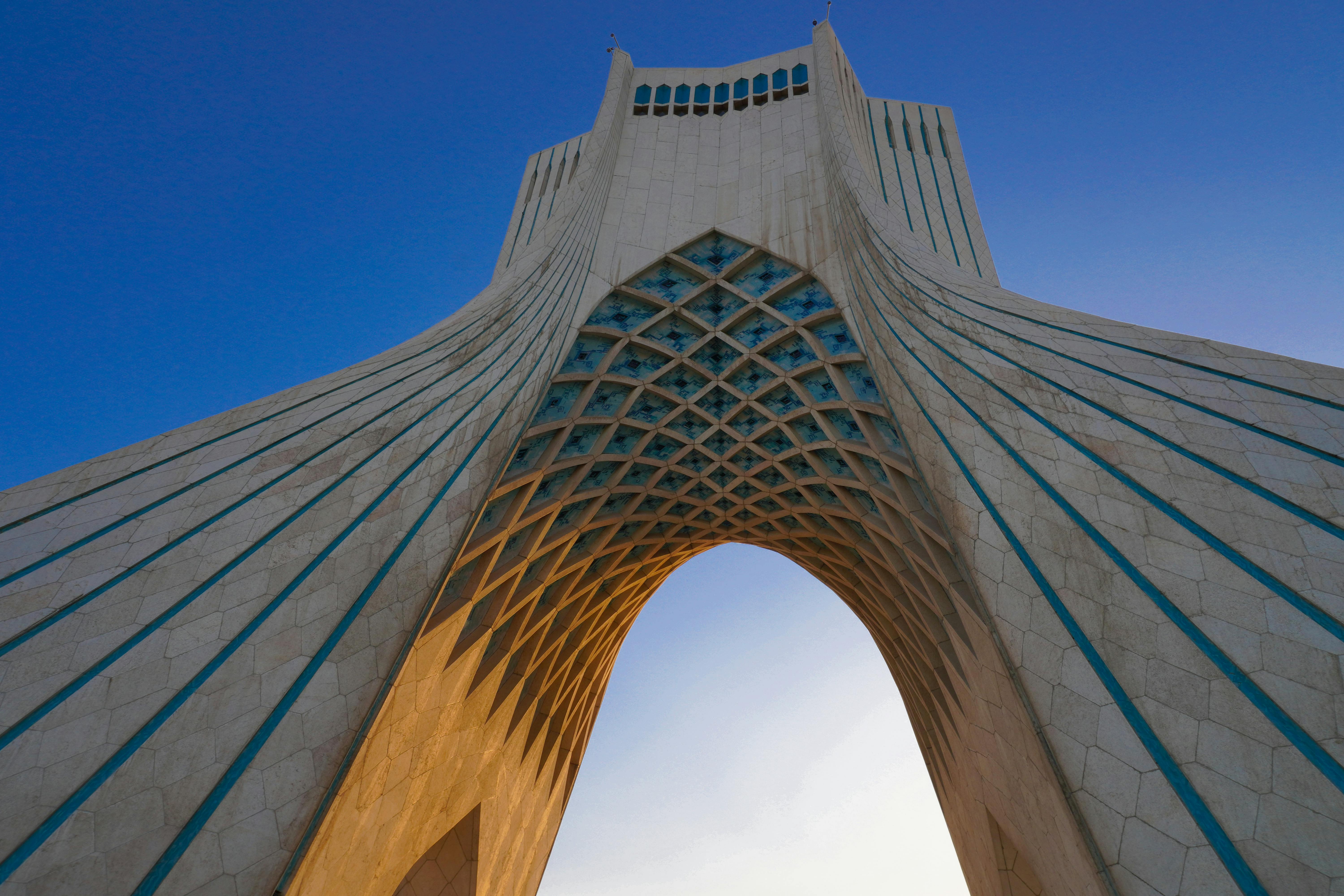 a picture of the azadi tower in low angle photography