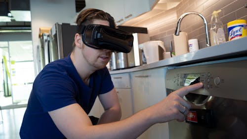 Free Man using Black VR Glasses Stock Photo