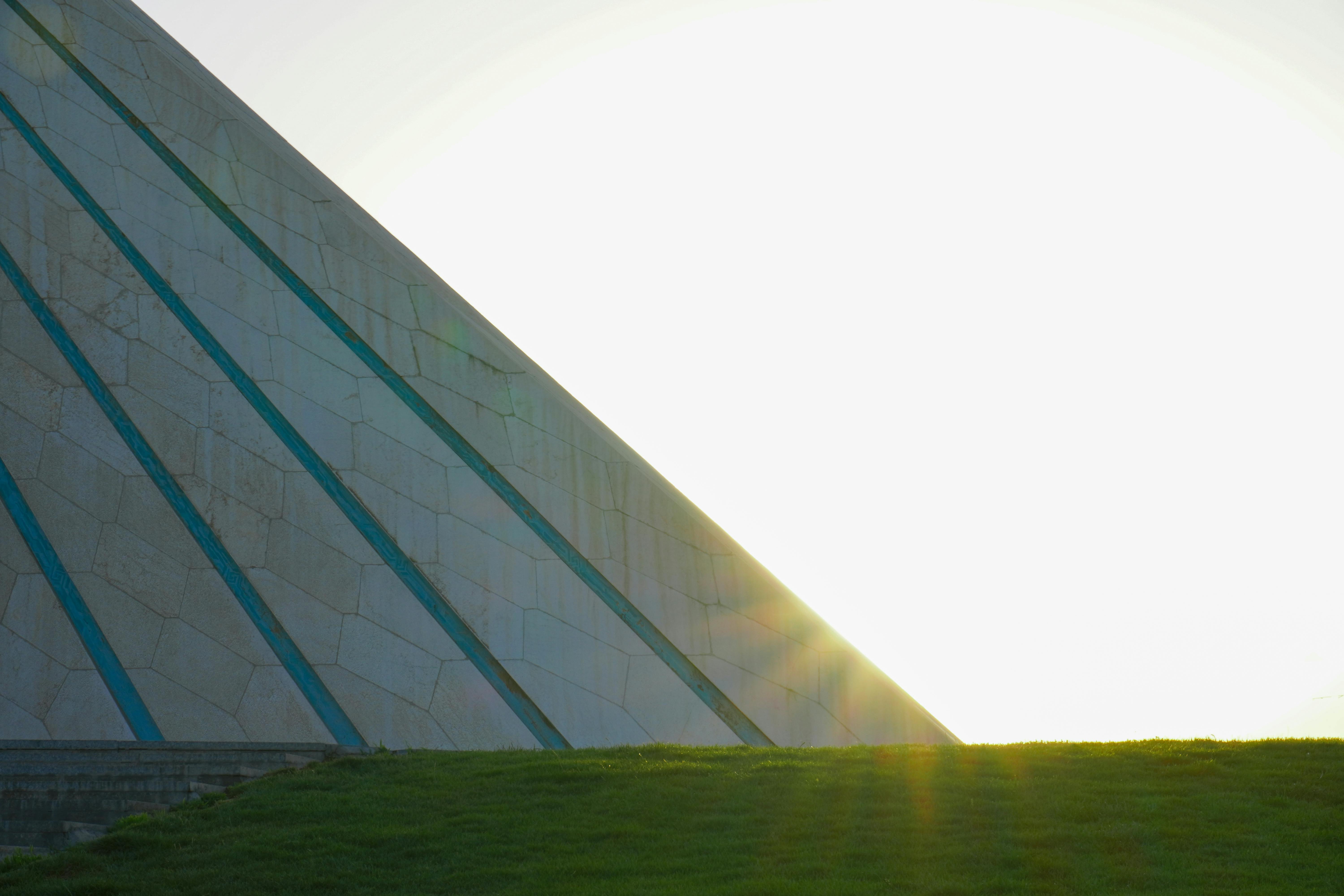 photo of green grass near the azadi tower