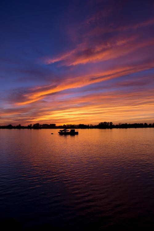 Free stock photo of backlit, blue sky, boat