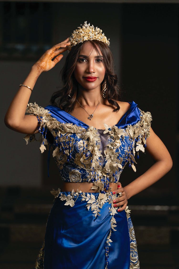 Woman Wearing A Blue Gown 