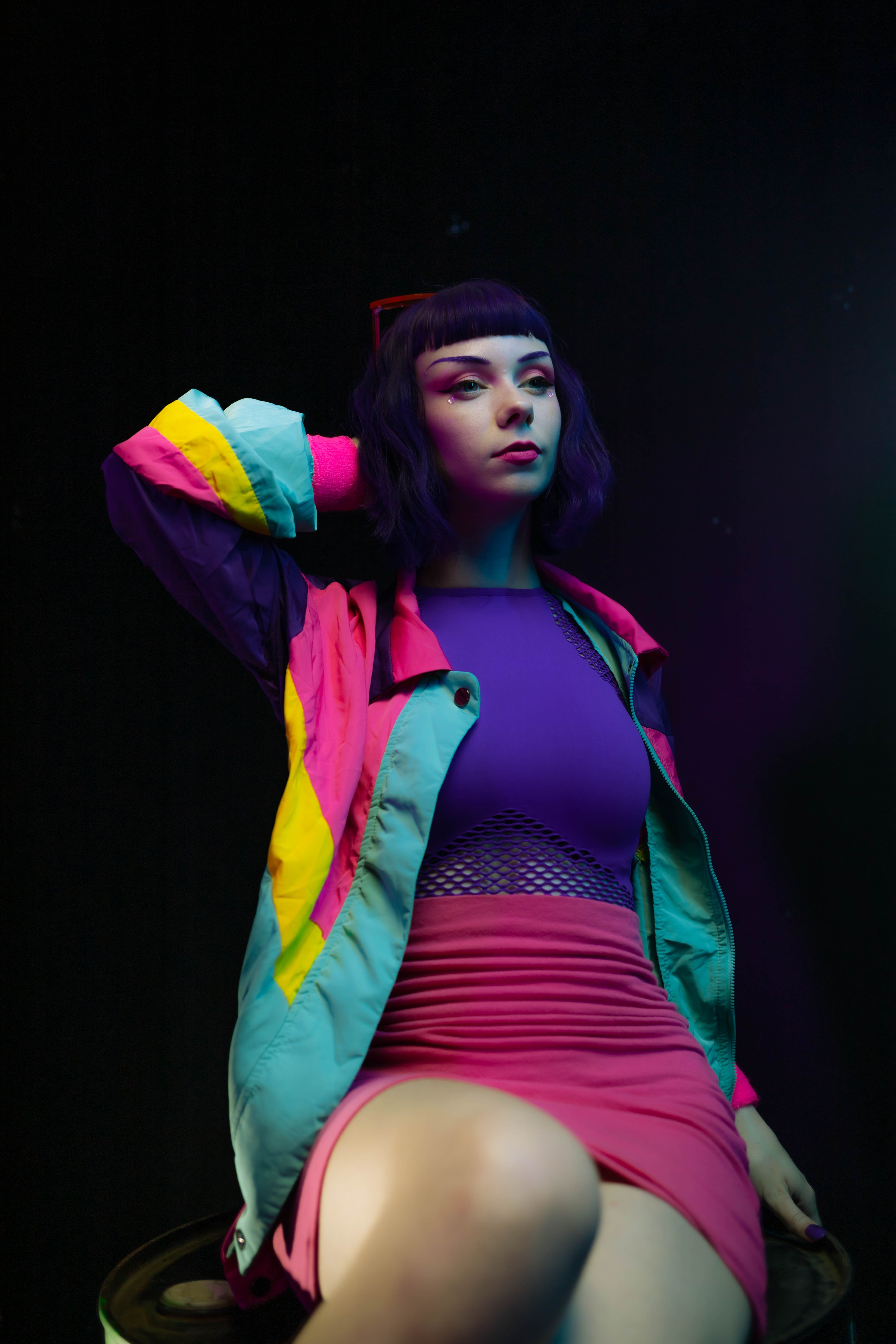 Photo of a Woman in Colorful Clothes · Free Stock Photo
