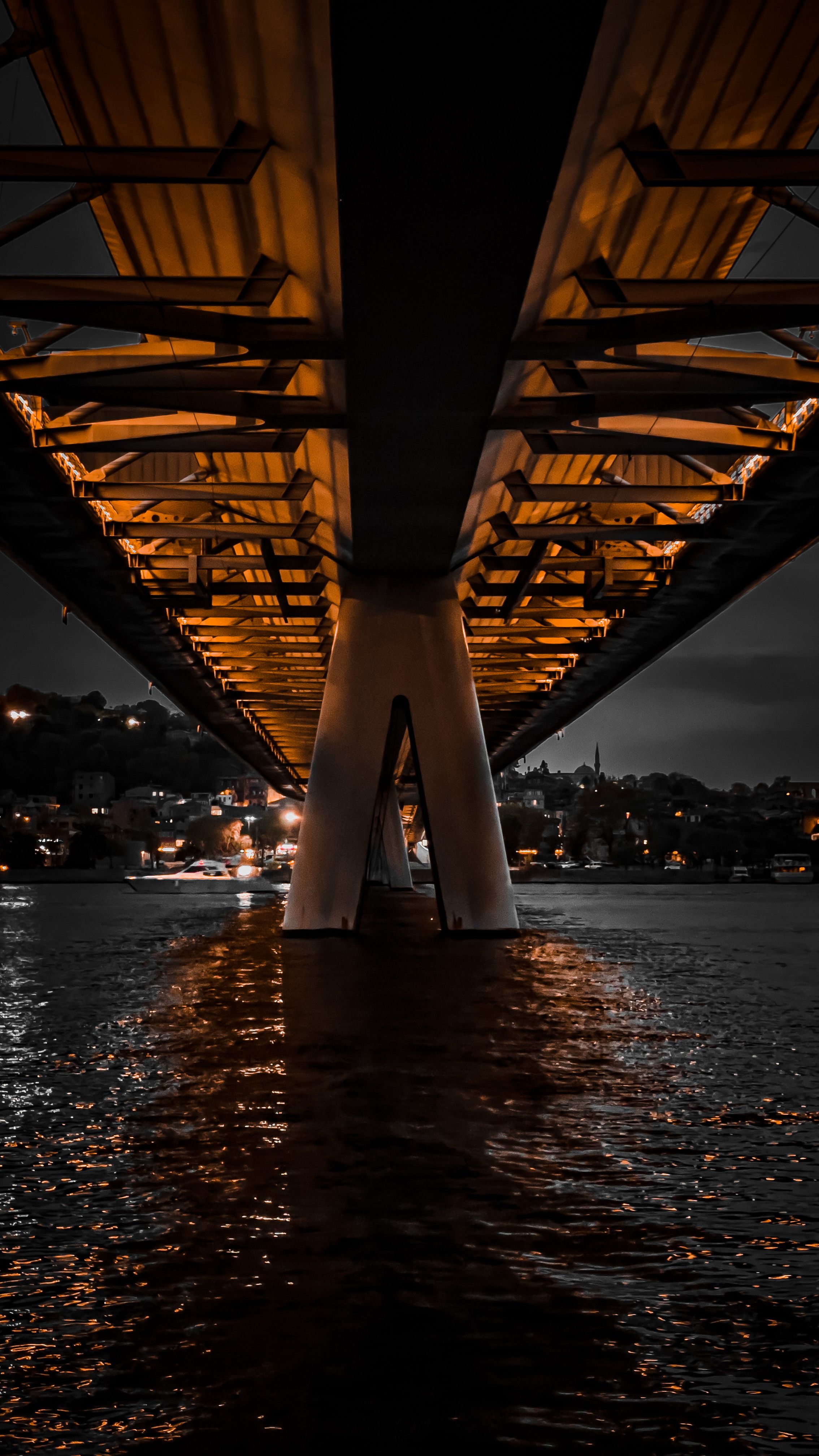 Illuminated Underbelly of Bridge across River · Free Stock Photo