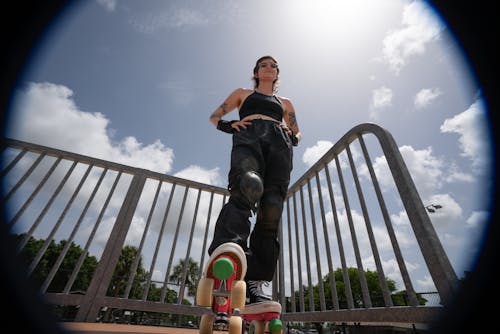 Low-Angle Shot of a Woman with Roller Skates