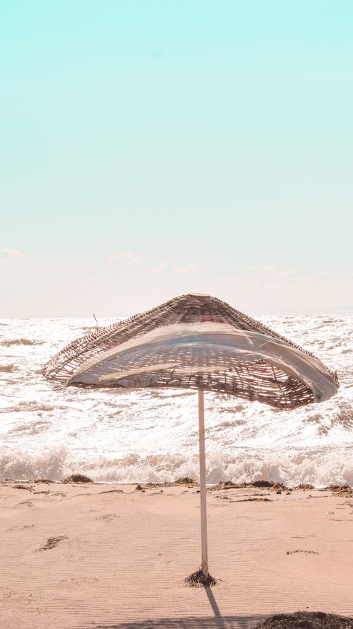 A Beach Umbrella on the Sand