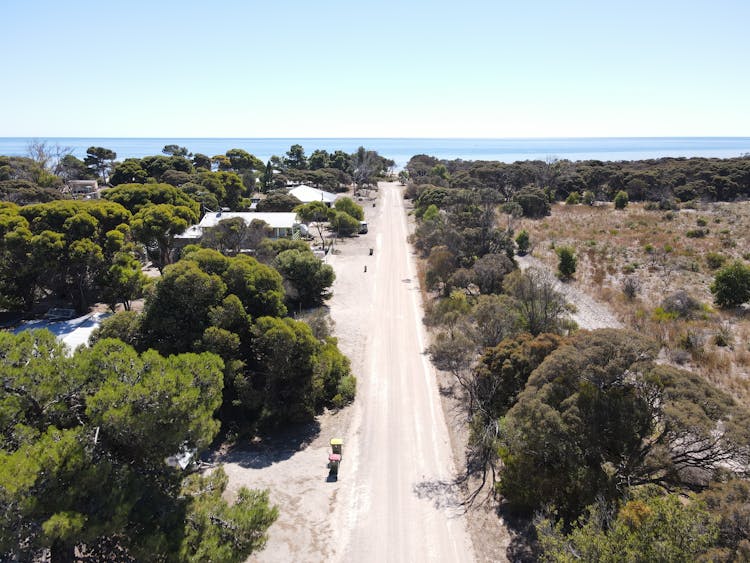 Aerial View Of Sandy Road Towards Sea