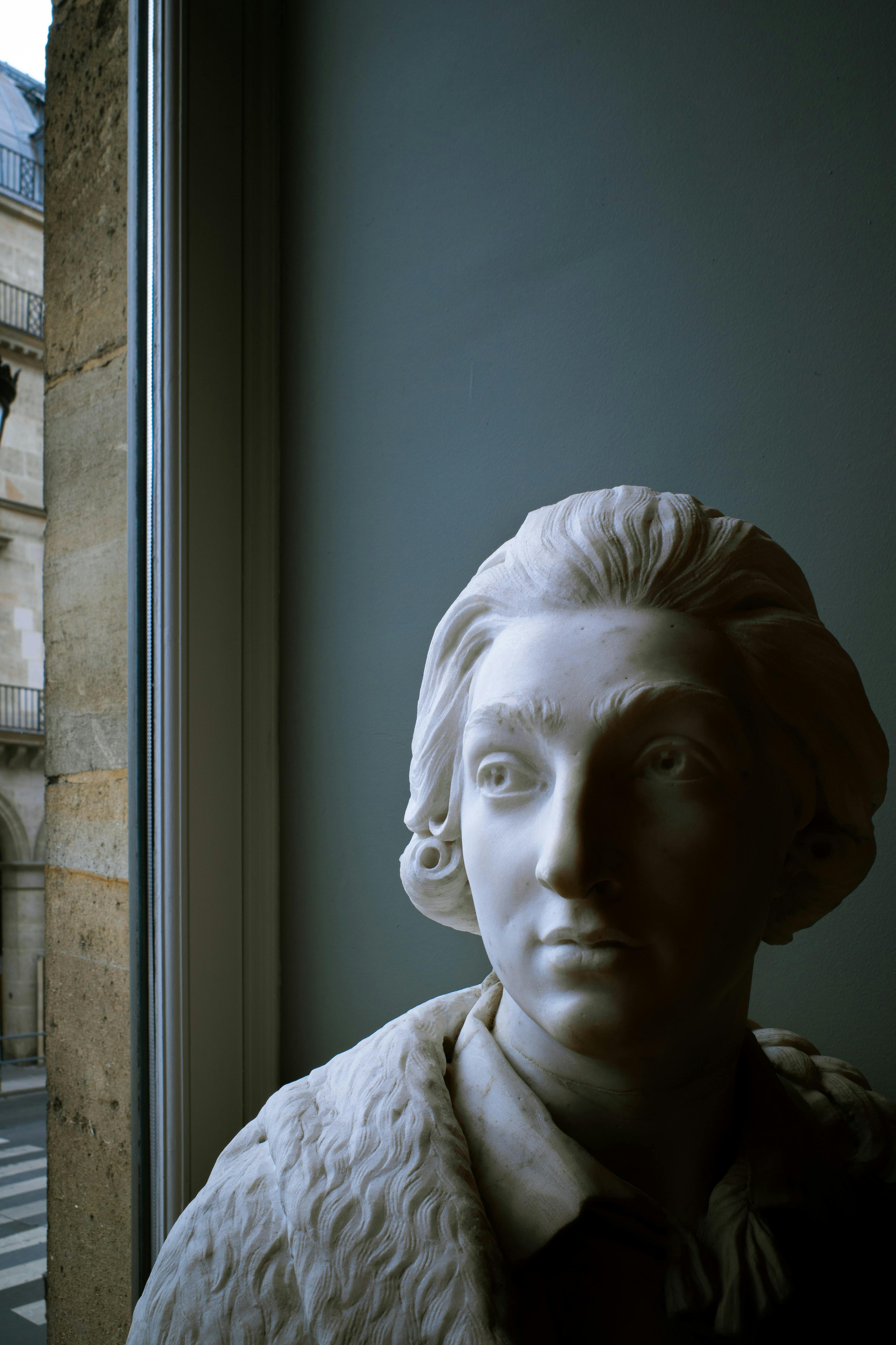 Sculpture beside a Window · Free Stock Photo